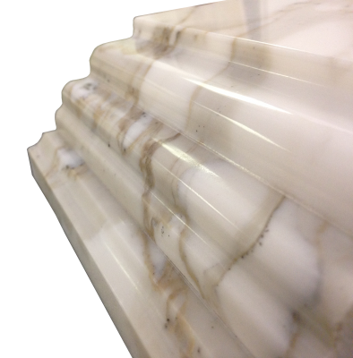 A custom edge on calacatta oro marble. A custom edge on calacatta oro marble.