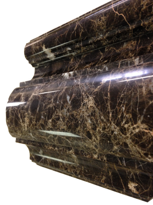 A custom edge on dark emperador marble. A custom edge on dark emperador marble.