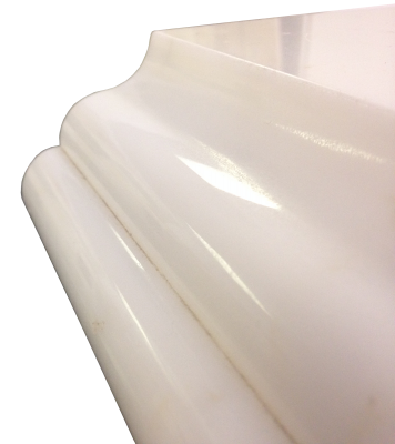 A laminated edge with an ogee and bullnose on calacatta oro marble. A laminated edge with an ogee and bullnose on calacatta oro marble.