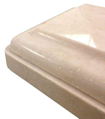 A laminated edge with an ogee and apron on navona travertine. A laminated edge with an ogee and apron on navona travertine.