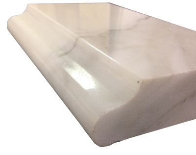 An ogee bullnose edge on calacatta marble. An ogee bullnose edge on calacatta marble.