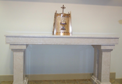 An altar made of botticino marble. An altar made of botticino marble.