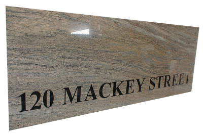 Inlaid sign made out of juparana maraviglia granite. Inlaid sign made out of juparana maraviglia granite.