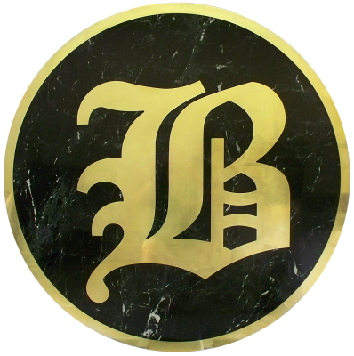 Inlaid sign made out of empress green marble.