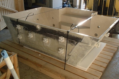 Preparing a custom crema marfil marble spa for shipping. Preparing a custom crema marfil marble spa for shipping.