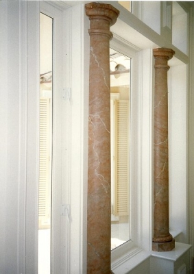Turned columns split into pilasters. Turned columns split into pilasters.